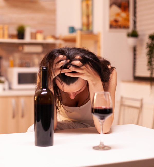 woman-thinking-about-suicide-after-drinking-bottle-wine-because-life-problem-depression-unhappy-person-disease-anxiety-feeling-exhausted-with-having-alcoholism-problems-min